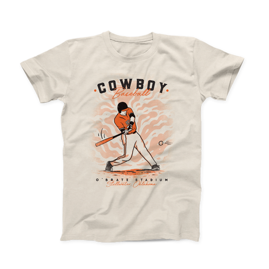 Natural colored OSU T-shirt. "Cowboy Baseball" across the top. OSU Baseball player mid strike in the middle of the shirt. "O'Brate Stadium, Stillwater Oklahoma" Across the bottom. "Baseball" & location printed in an orange script font. "Cowboy" & "O'brate Stadium" in a sans serif black font.  