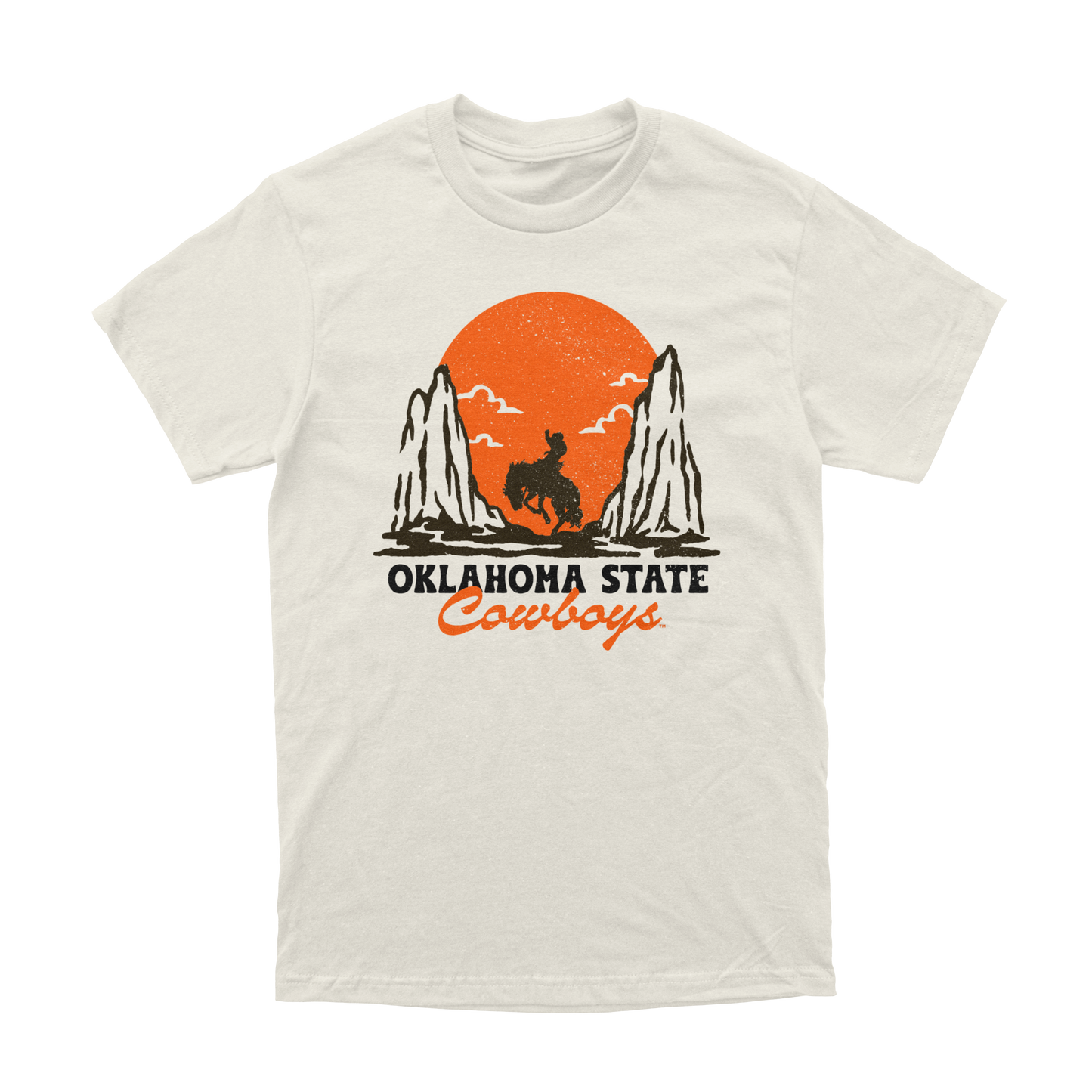 Front of natural colored T-shirt with cowboy silhouette and orange sunset