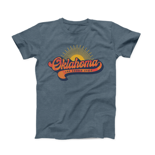 Front of heather slate t-shirt with retro orange and yellow Oklahoma sunrise design. June 2021 Oklahoma Shirt of the Month.