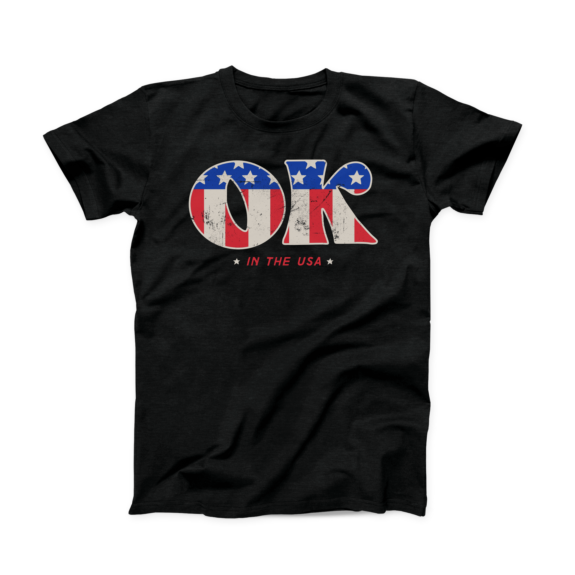 Solid black colored Oklahoma t-shirt. Screen printed in a vintage, distressed style is a large "OK" with the American flag print inside the letters.  And in smaller font below is "IN THE USA" in red with a small white star on either side. 