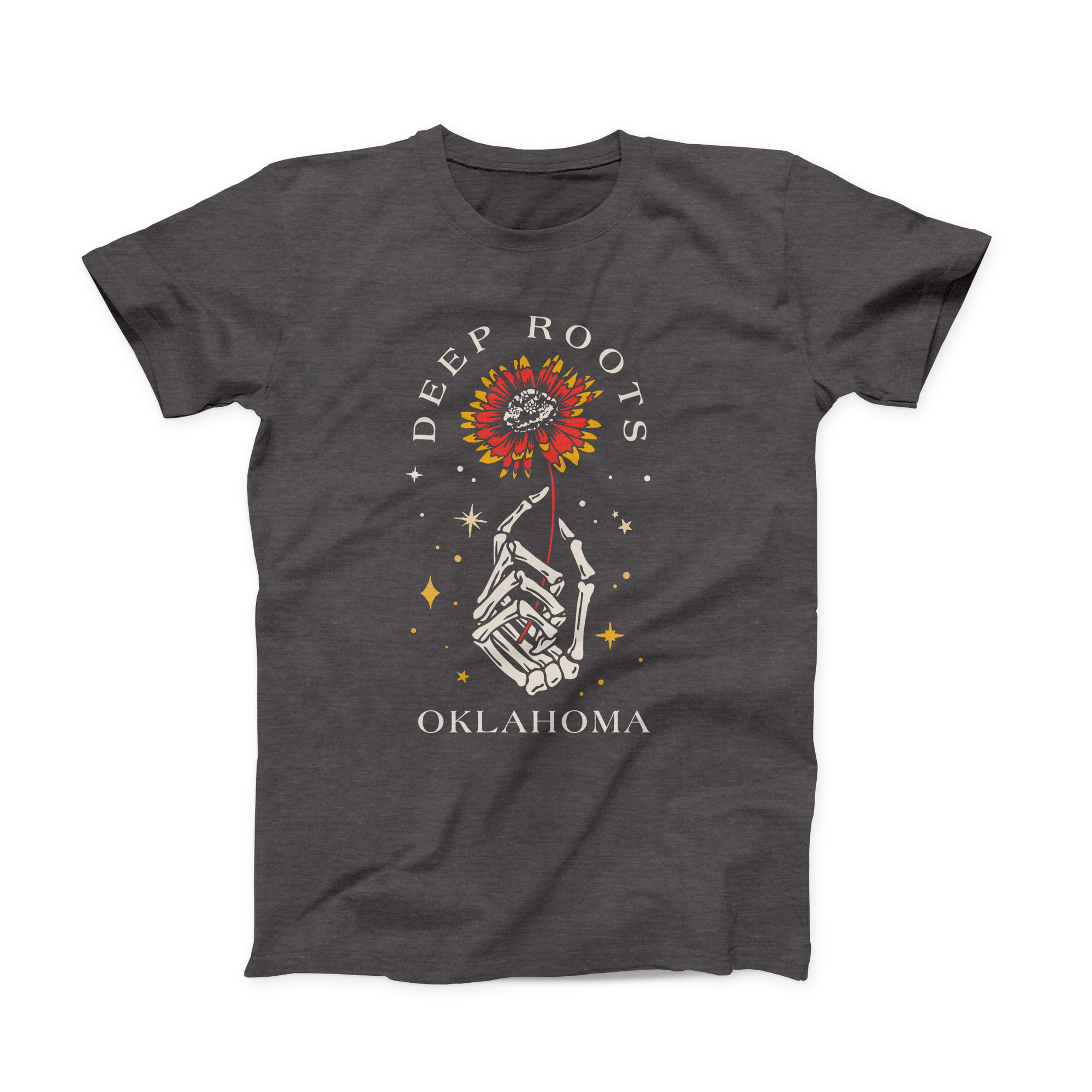 Front of dark grey heather shirt with skeleton hand holding Indian Blanket flower. October 2021 Oklahoma Shirt of the Month.