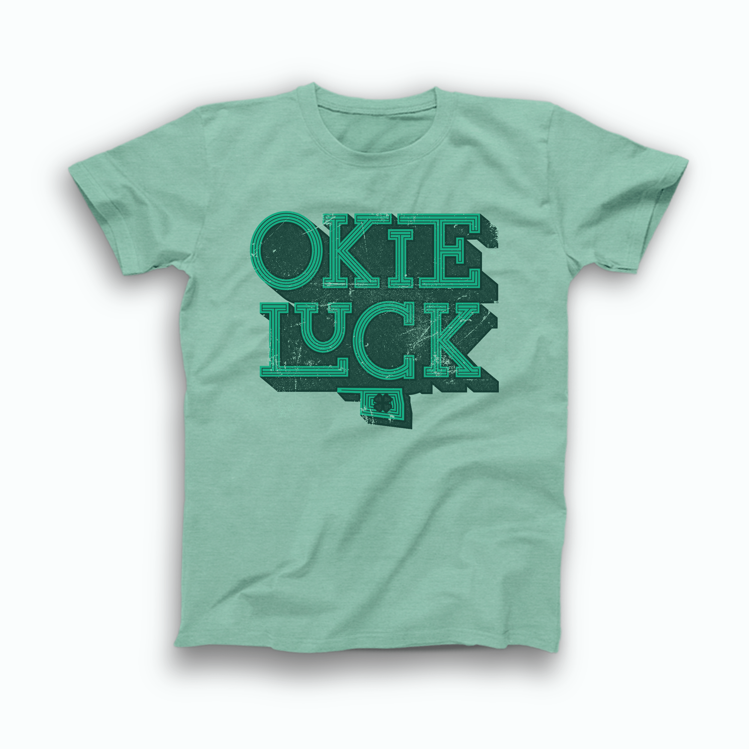 Mint green t-shirt with bold Okie Luck lettering inside Oklahoma outline and clover accent, March 2020 Shirt of the Month