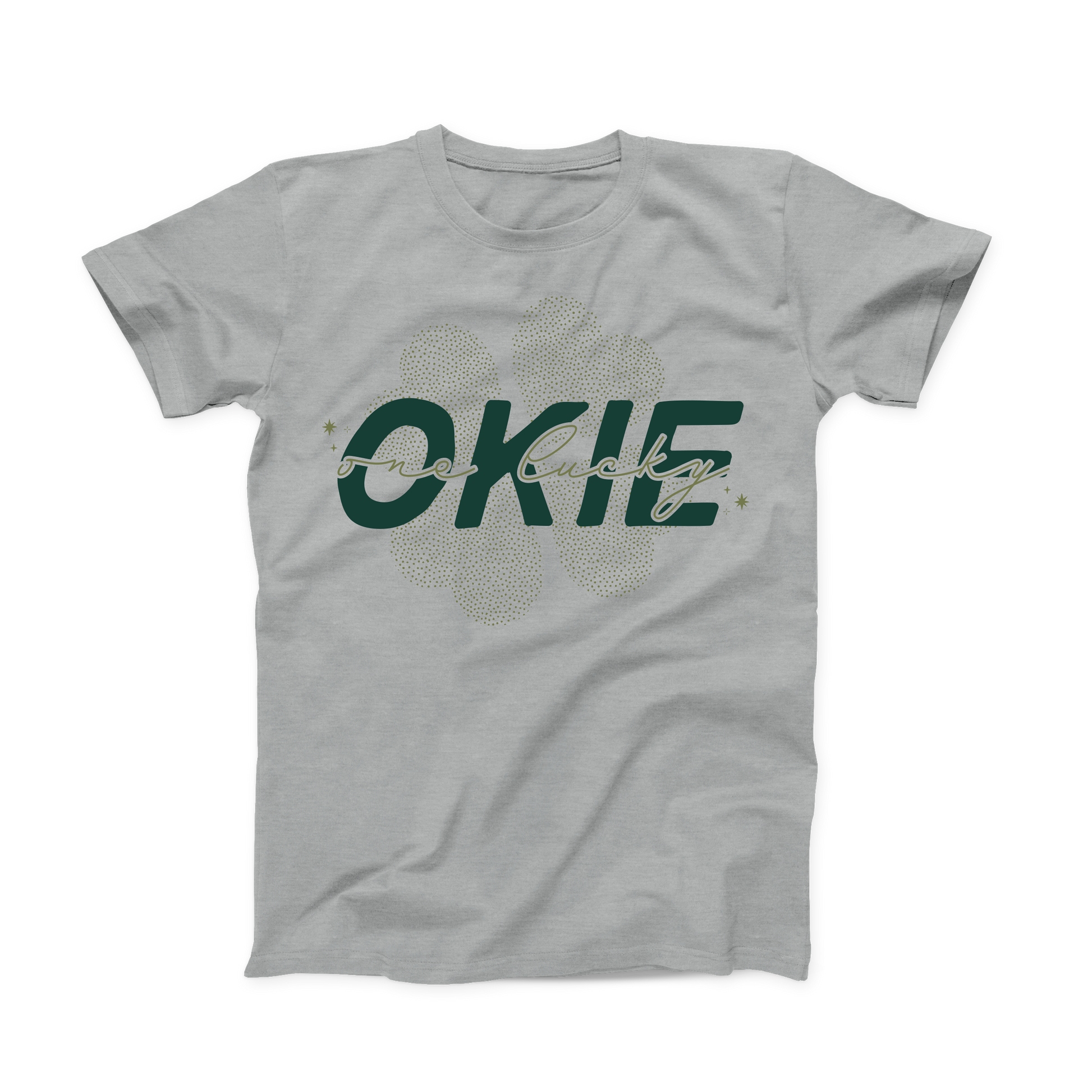 Athletic Heather grey colored Oklahoma T-shirt. Made from tiny olive green dots in the background is a 4 leaf clover. In front of that is "OKIE" in large, bold dark green font. And, scrawled in script in front of that is "one lucky" in olive green.